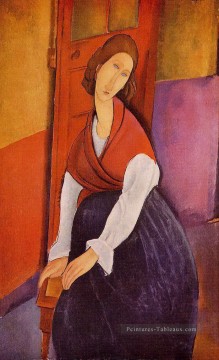jeanne hebuterne devant une porte 1919 Amedeo Modigliani Peinture à l'huile